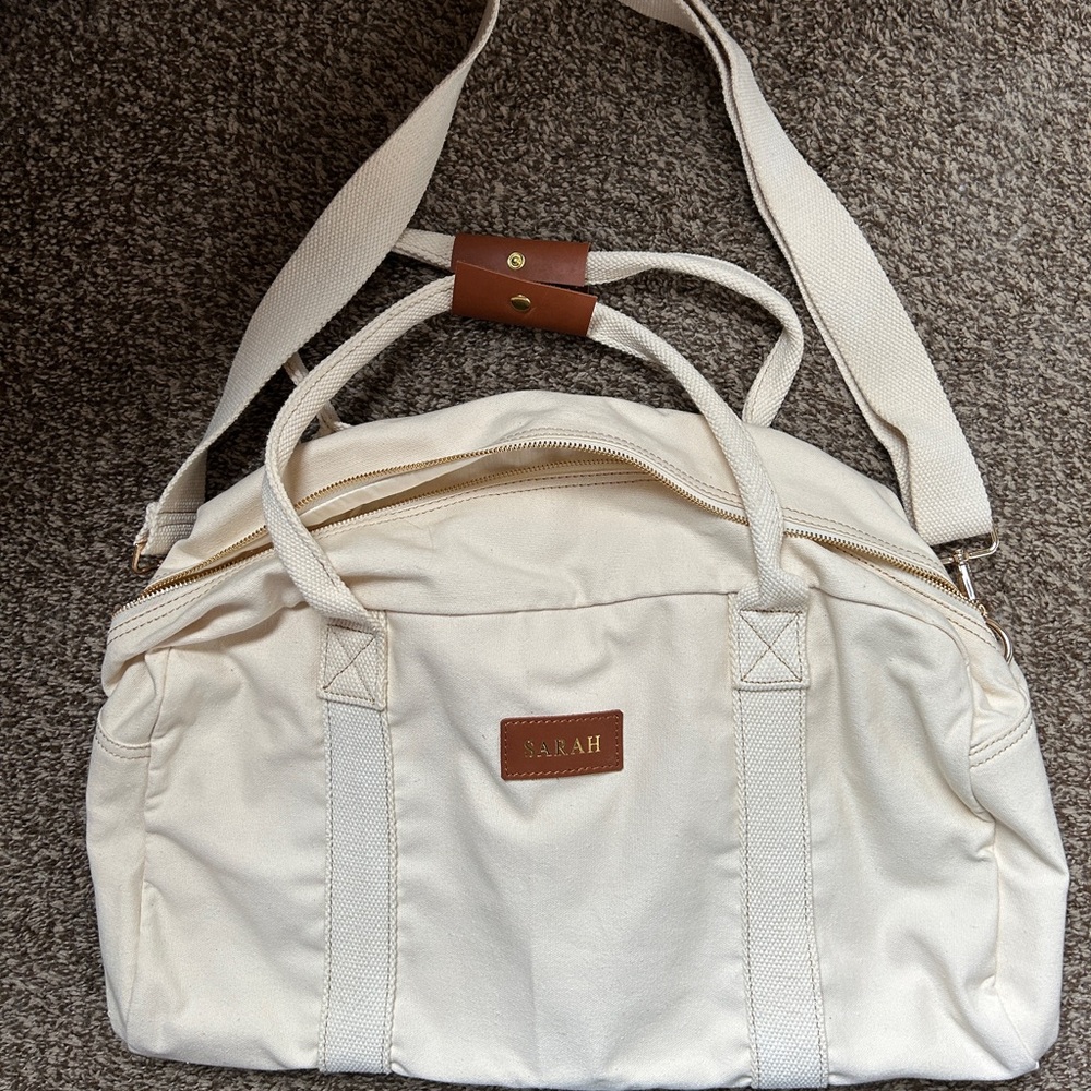 Cream Overnight Bag with the name Sarah